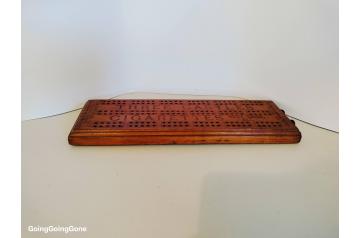 Collectible wooden cribbage board