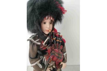 Porcelain Scottish Bagpiper