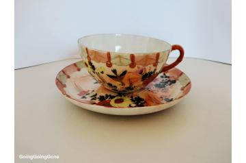Antique Kutani cup and saucer