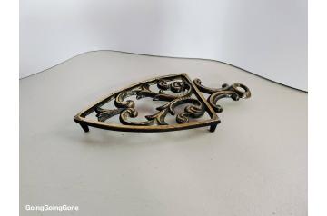 Brass sad iron trivet